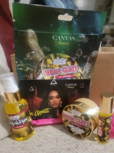 Customer's Canvas Dill Breaker Discovery Set, including Body Drops with a pump, a jar of Body Glaze, and a rollerball.