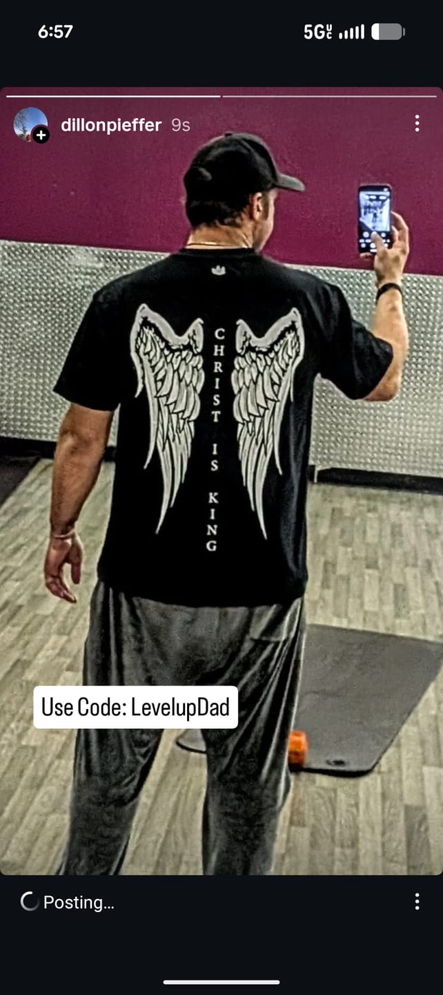 Customer photo review of Christ is King Wing Premium Oversized Tee