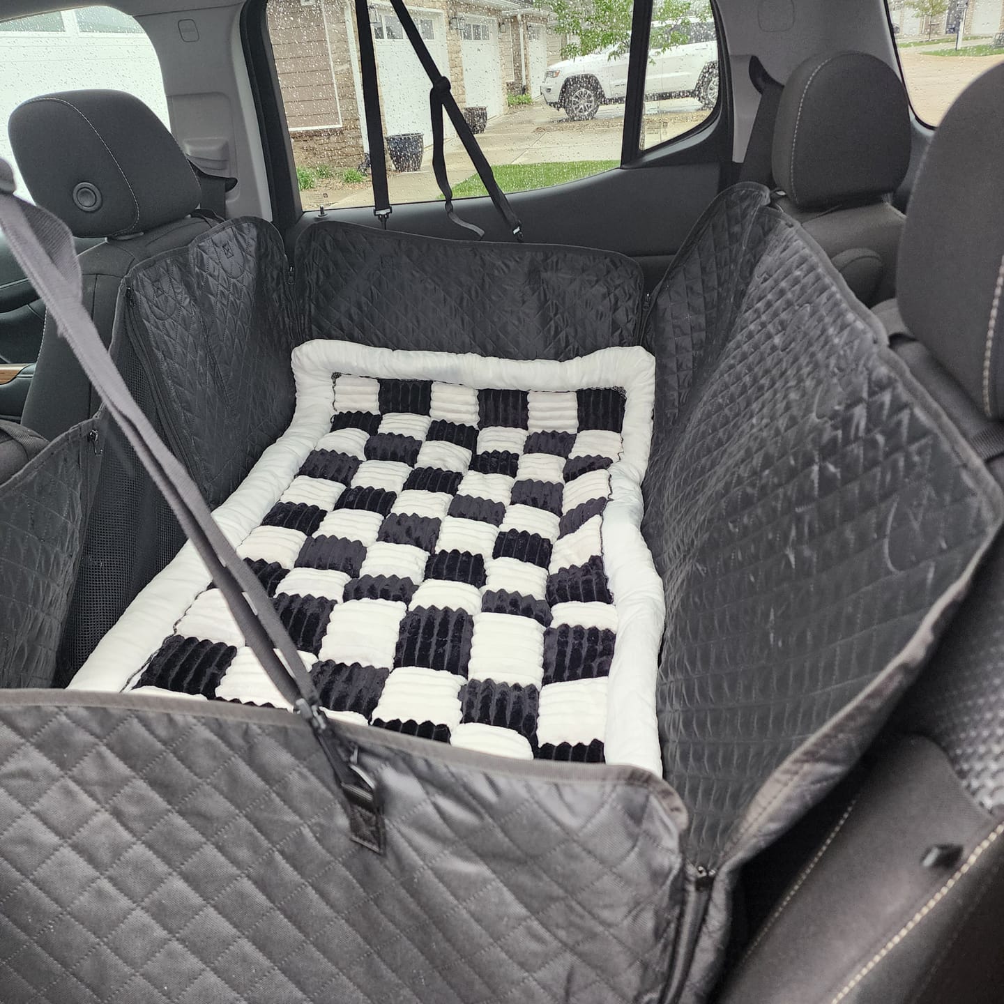 Customer photo review of NEW Waterproof Hard Bottom Car & Truck Seat Foldable Hammock Cover With Storage Pockets, Side Flaps, Headrest Straps, Seat Anchors, & Mesh Window (+FREE SAFETY BELT!)