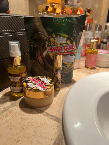 Customer's CANVAS DILL BREAKER DISCOVERY SET displayed on a bathroom counter.