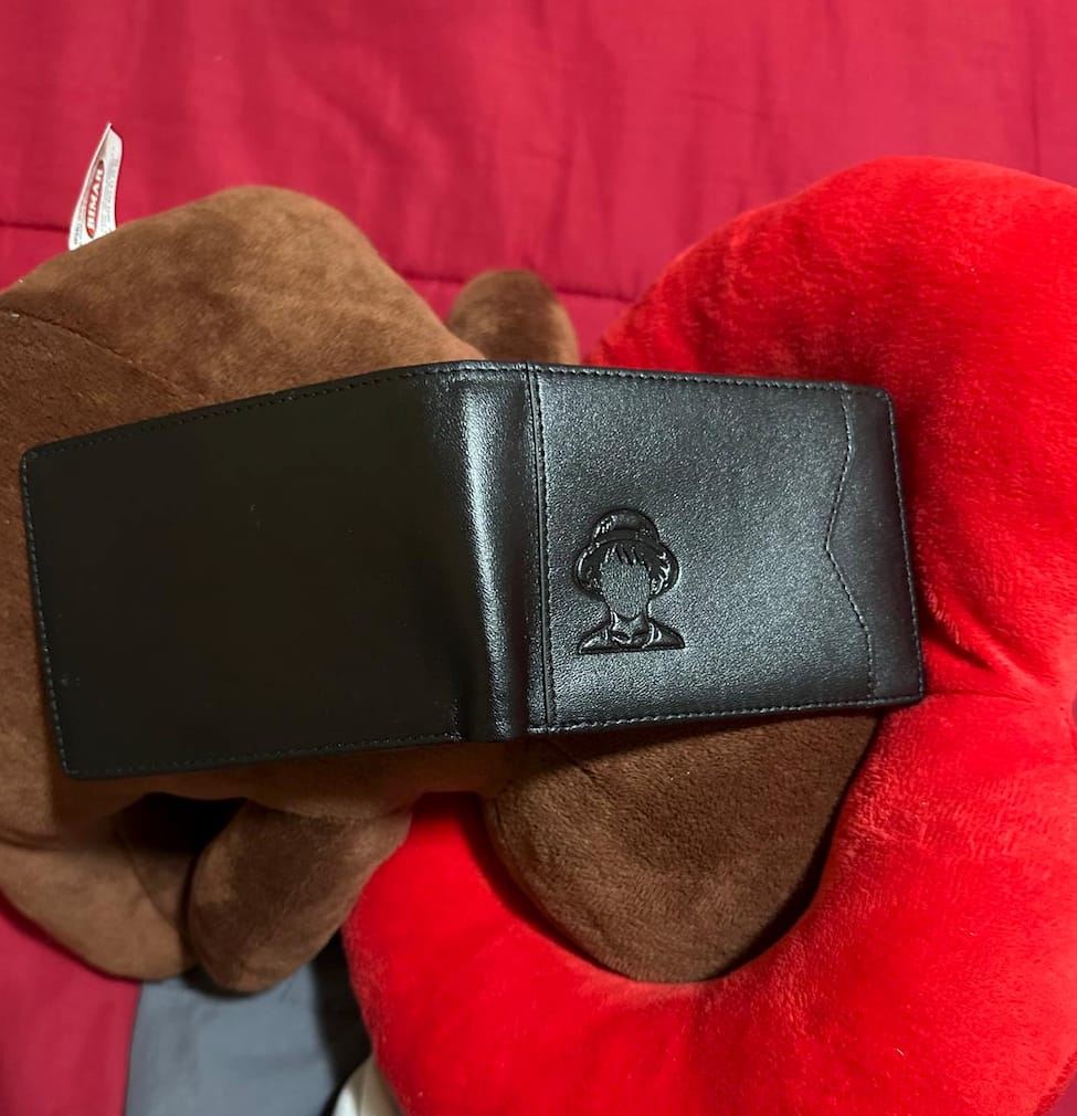 Customer photo review of Cartera Identidad Oscura