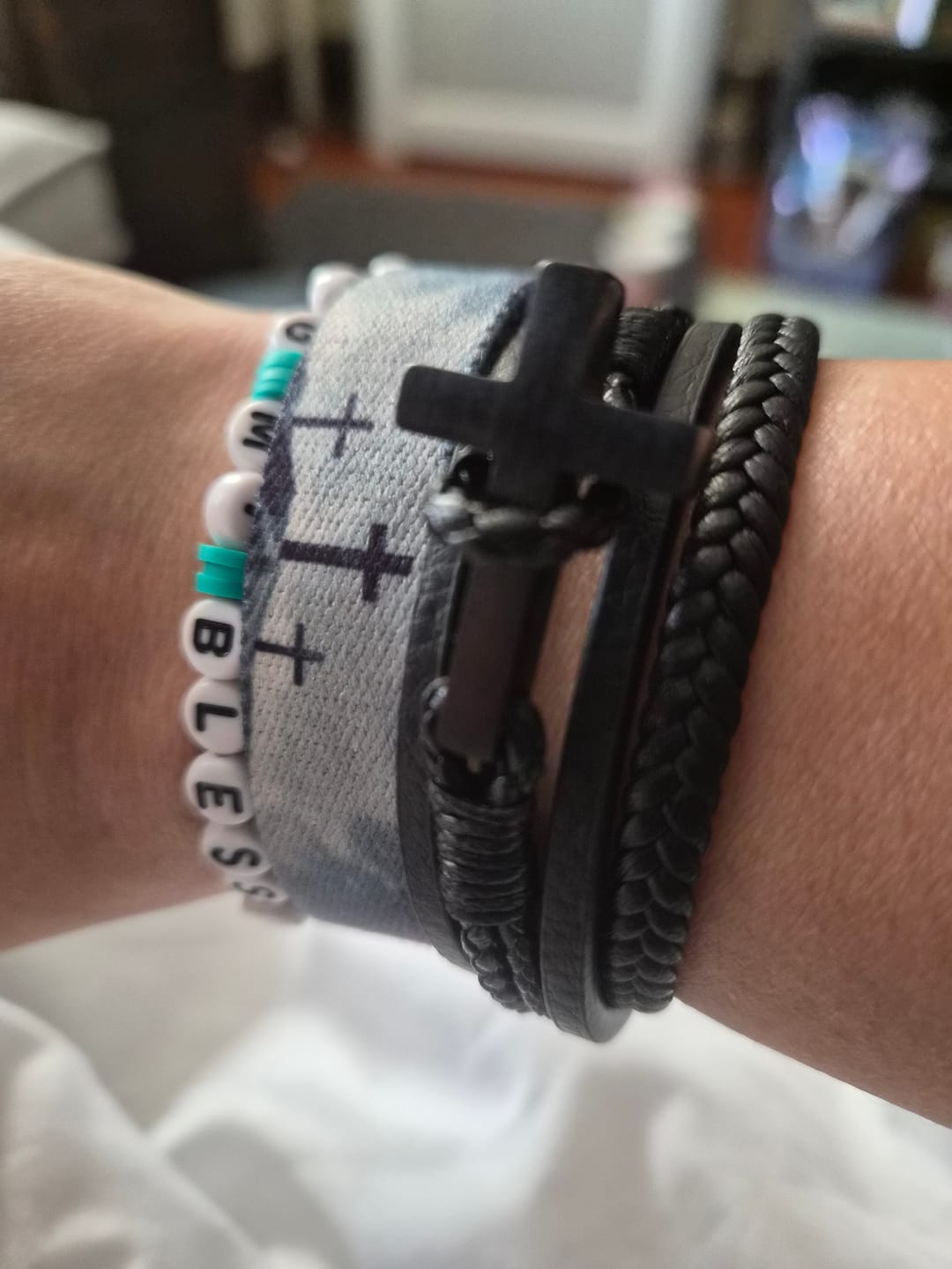 Customer photo review of Christianartworkshop Tri - Color Stainless Steel Cross & Braided Leather Fashion Bracelet