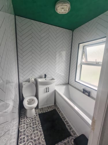 Customer photo review of Premium White Herringbone Tile Gloss Shower Wall Panel – 1M x 2.4M