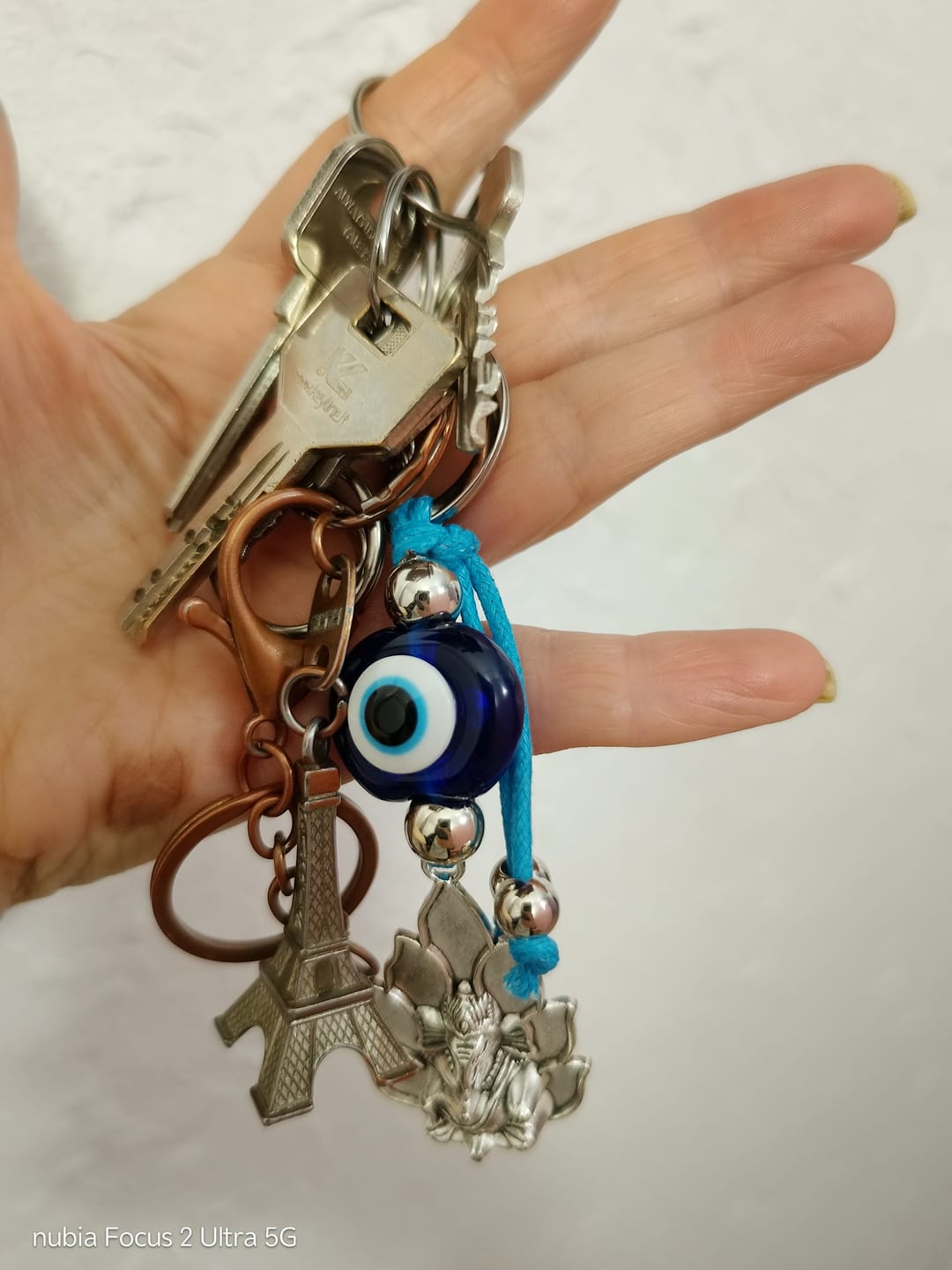 Customer photo review of Llavero Ganesha y Ojo Turco de Protección