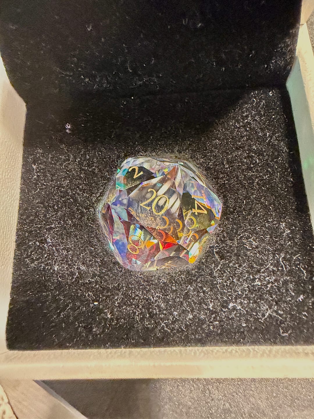 Customer photo review of URWizards D&D Multi-faceted Prism Glass Engraved Dice Set