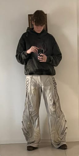 Reviewer showing the fit of the Personsoul Totem Embroidered Washed Hoodie in a full-length photo.