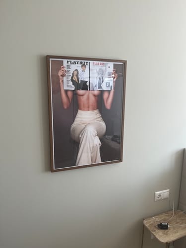 Customer's 'Made To Look V2' art print in a dark frame, hanging on a light-colored wall in their home.