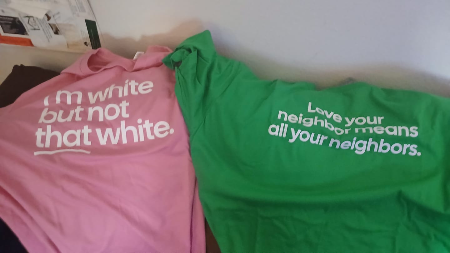 Customer photo review of Love Your Neighbor Means All Your Neighbors Unisex Tee