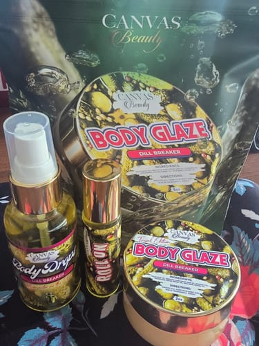 Reviewer's Dill Breaker Discovery Set, showing the Body Glaze, Body Drops, and Roll-On products with their gold caps.