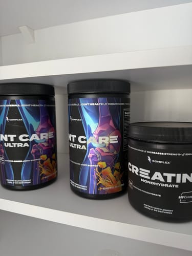 Customer's tub of Creatine Monohydrate on a shelf with other Complex brand supplements.