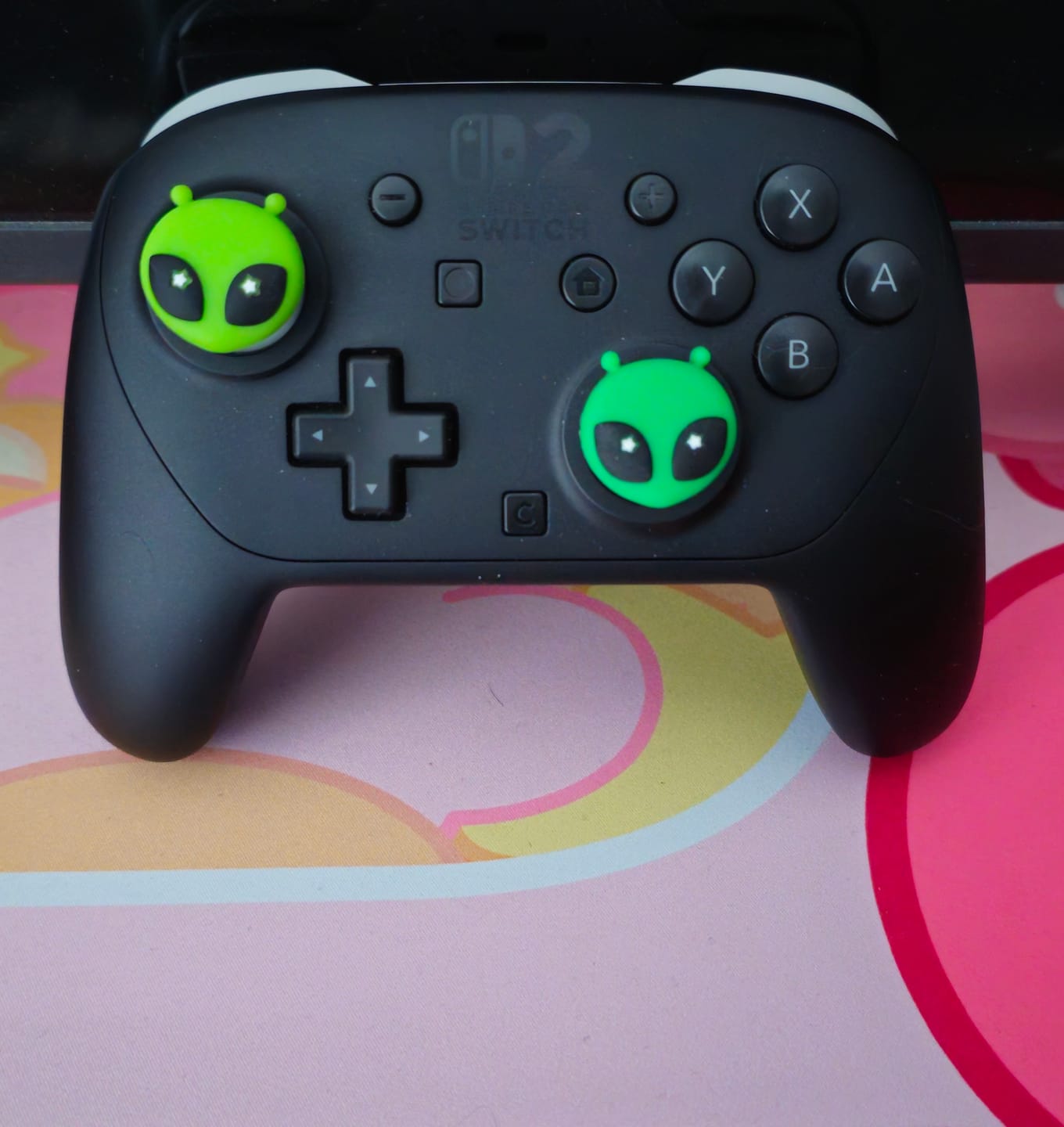 Customer photo review of GeekShare Aliens Attack  Thumb Grip Caps for Switch 2
