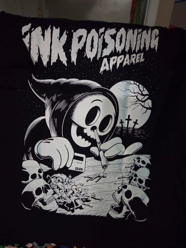A customer's black Death Junkie t-shirt, showing the large white graphic of a cartoon grim reaper.