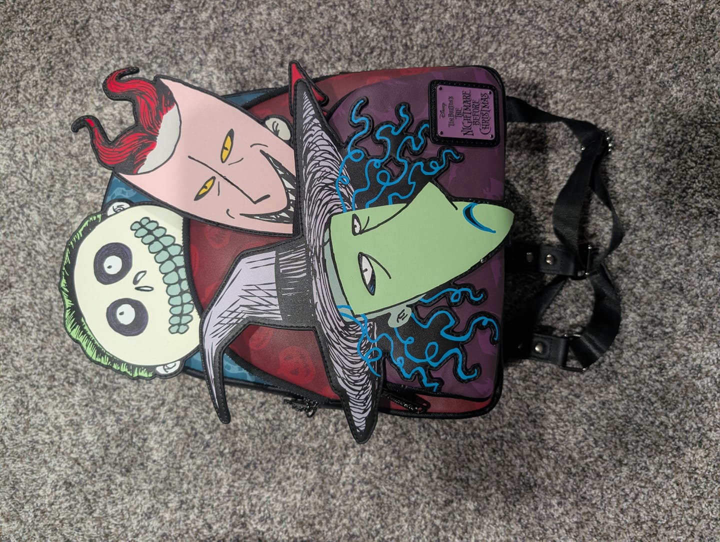 Customer photo review of Loungefly Disney Nightmare Before Christmas Glow in the Dark Lock, Shock, and Barrel Triple Pocket Mini Backpack - 707 Street Exclusive