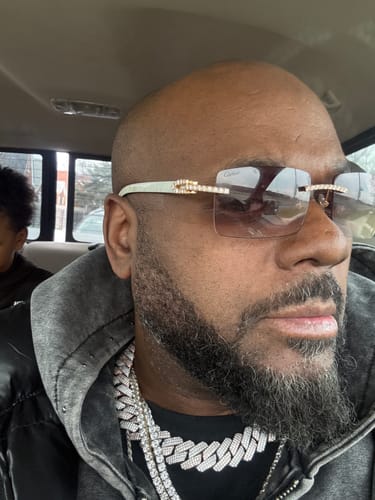 Customer photo review of Made to order: Iced out moissanite Diamond cut White Buffalo horn glasses