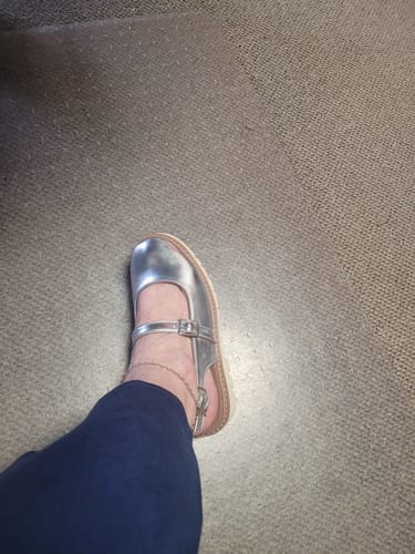 Customer wearing the silver metallic Corky's If You Say So Shoe, showing the straps and fit.