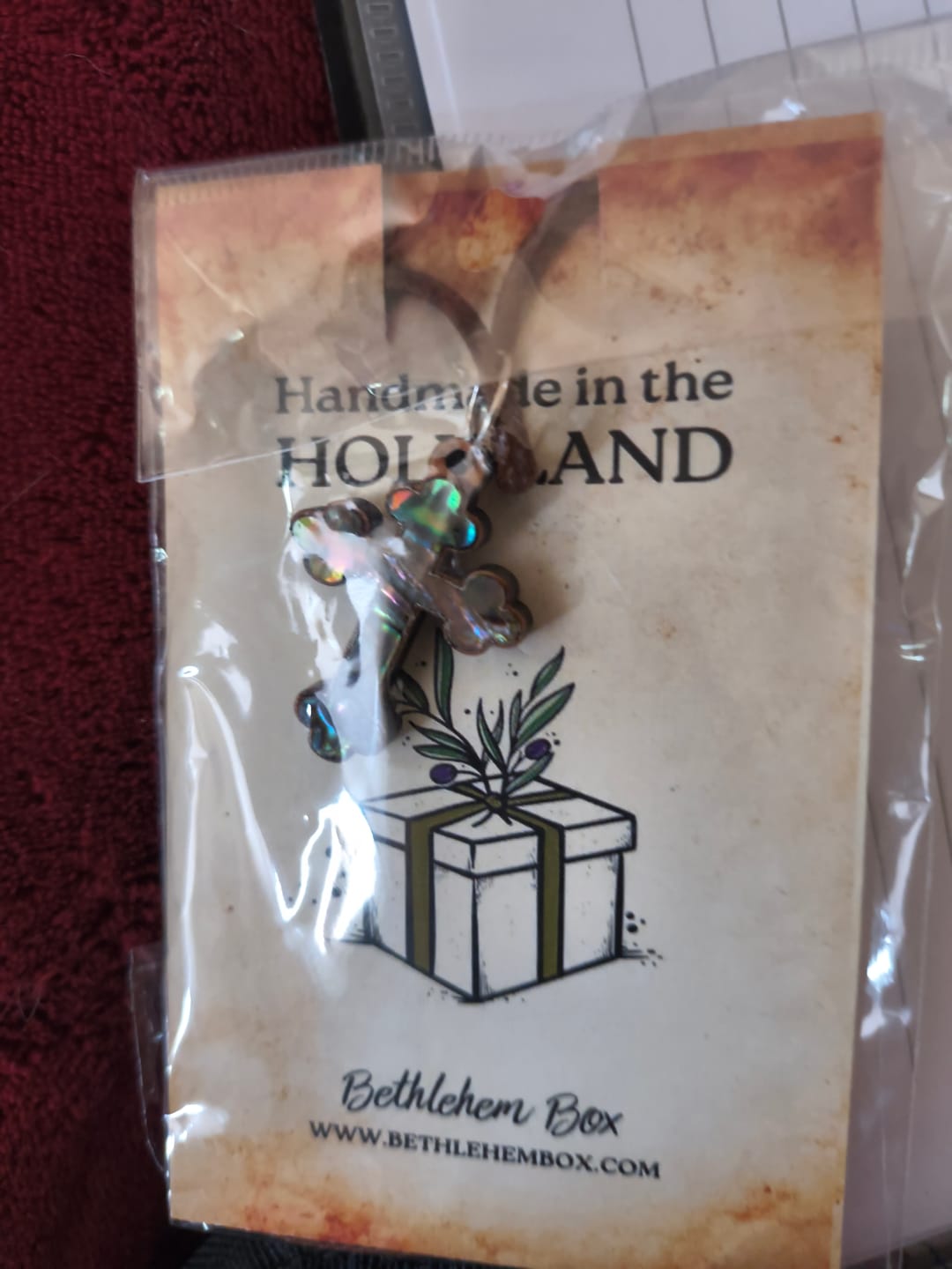 Customer photo review of Holy Land Olive Wood Mother of Pearl Cross Pendant