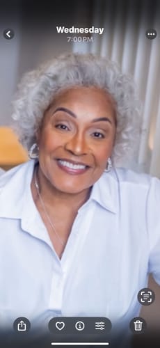 A customer smiles, showing her full and healthy hair after using Rennora Hair Growth Serum.