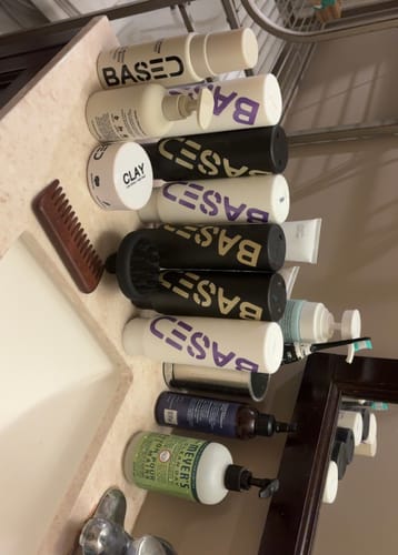 Customer's Refreshing Trio products arranged on a bathroom counter among other toiletries.