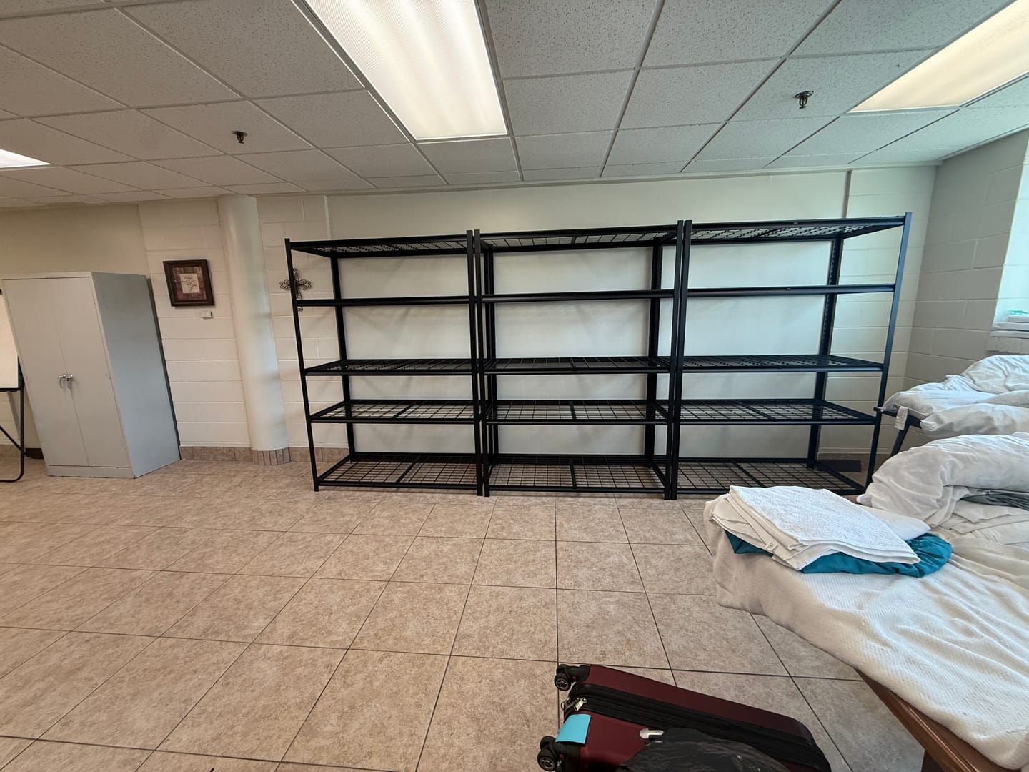 Customer photo review of REIBII 55.2" W 5-Tier Adjustable Metal Shelving, 3000LBS Heavy Duty Garage Shelves for Basement, Warehouse & Home Storage