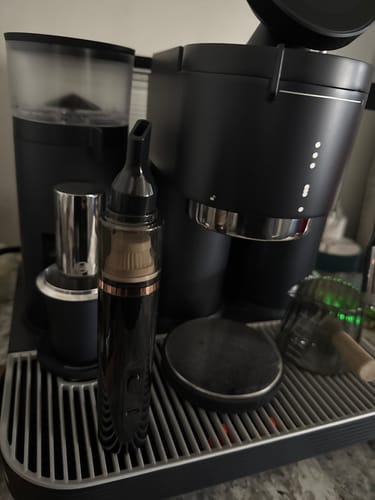 Customer's Barista Air Wand on a home coffee bar setup next to a grinder and espresso machine.