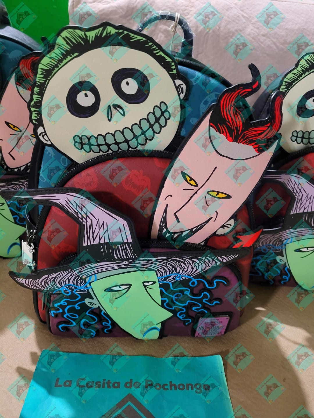Customer photo review of Loungefly Disney Nightmare Before Christmas Glow in the Dark Lock, Shock, and Barrel Triple Pocket Mini Backpack - 707 Street Exclusive