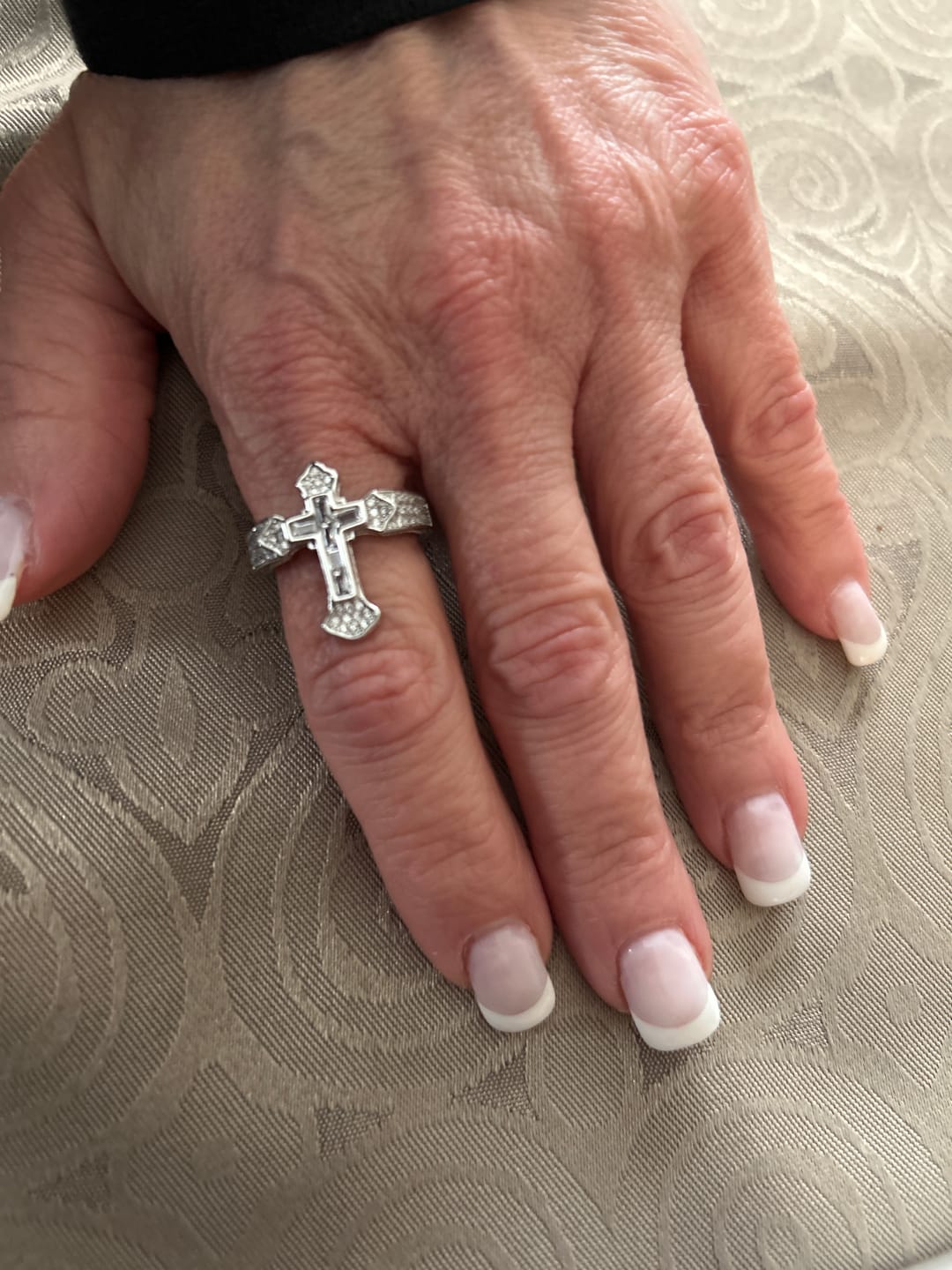 Customer photo review of Christianartworkshop Central Cross Motif Ring with Cubic Zirconia Accents: Carry His Care in Daily Wear