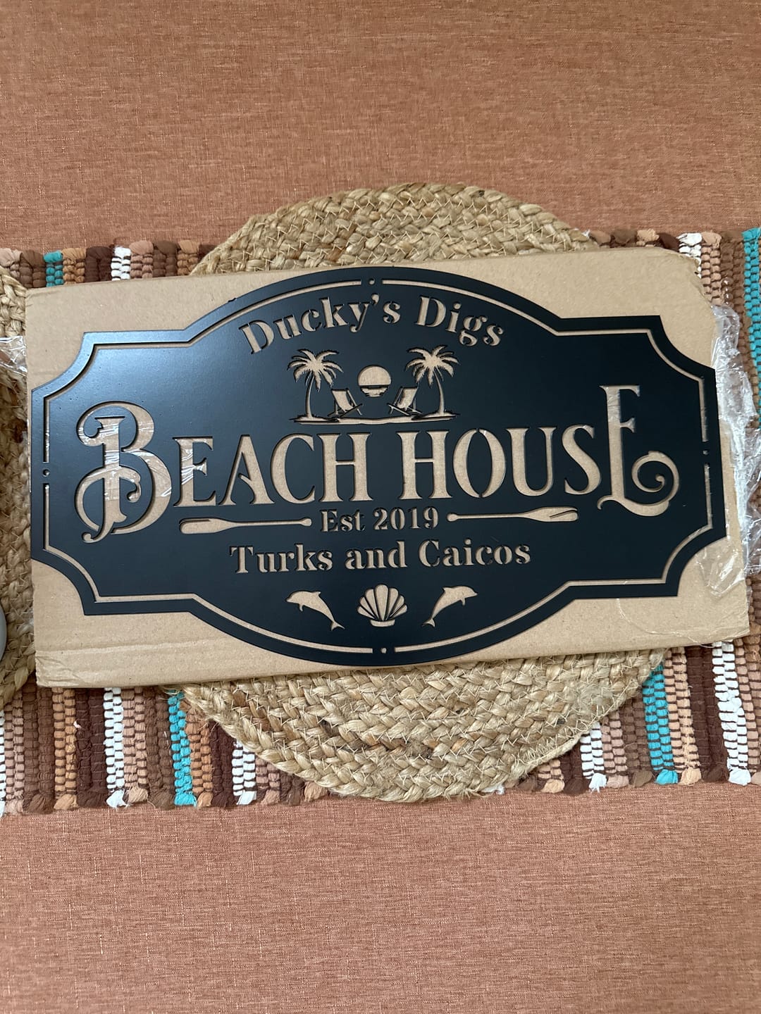 Customer photo review of Beach House Metal Sign