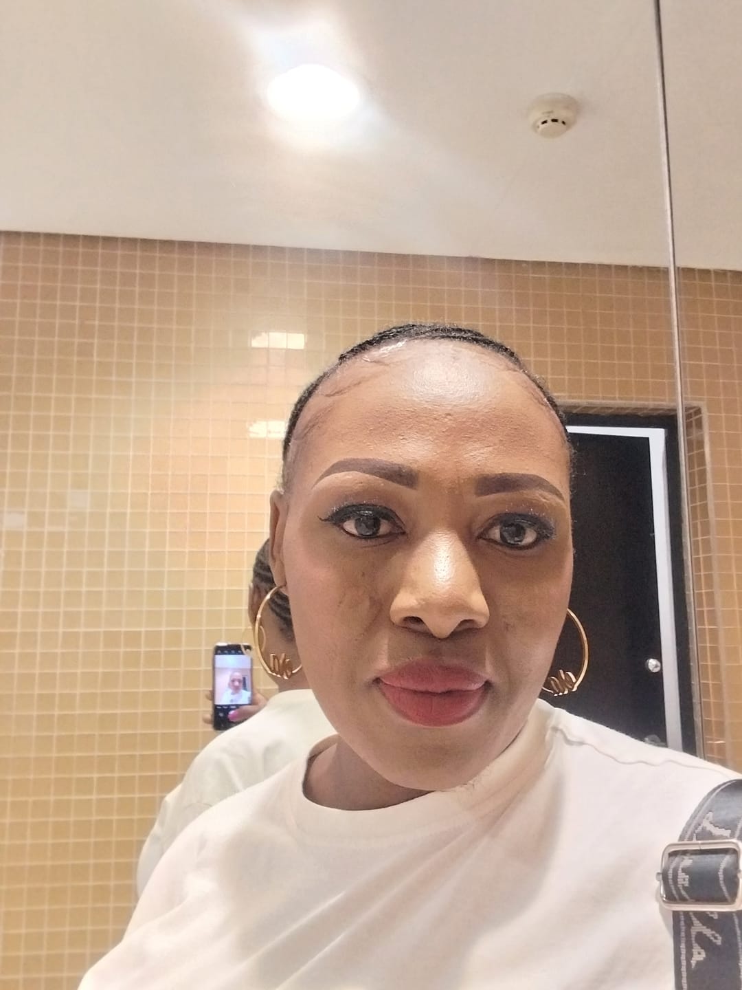 Customer photo review of Gold Precious Era Logo Hoops