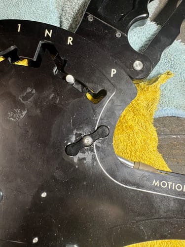 Close-up of the customer's new Shifter Dogbone and Bolt installed in the black shifter assembly.