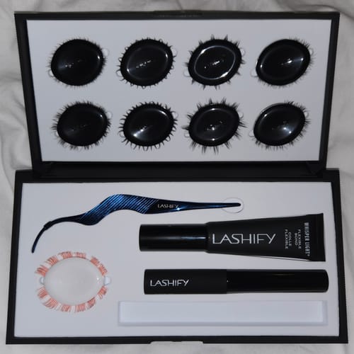Reviewer's black Empty Glutton case, open and filled with lashes and application tools.