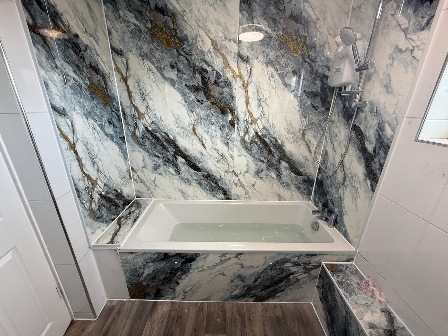 Customer photo review of 10mm Ocean Blue Gloss Shower Panel 1M x 2.4M