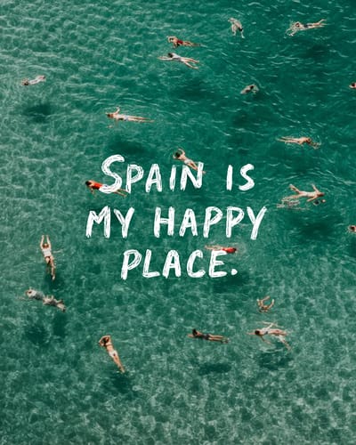 Customer's 'SPAIN IS MY HAPPY PLACE' wallpaper with an aerial view of people swimming in clear turquoise water.