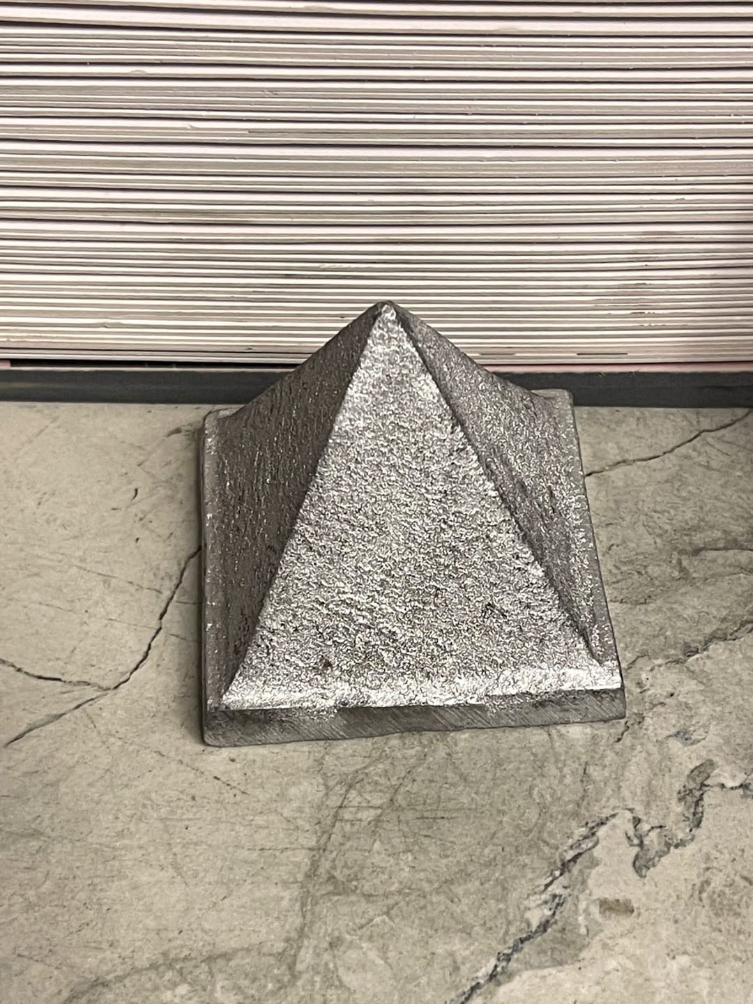 Customer photo review of Solid Iron Metal Pyramid Vastu Remedy for West Direction and Brahmasthan Balance, Mental Focus, Career Success and Positive Energy Correction | 7.6 cm | 800 g