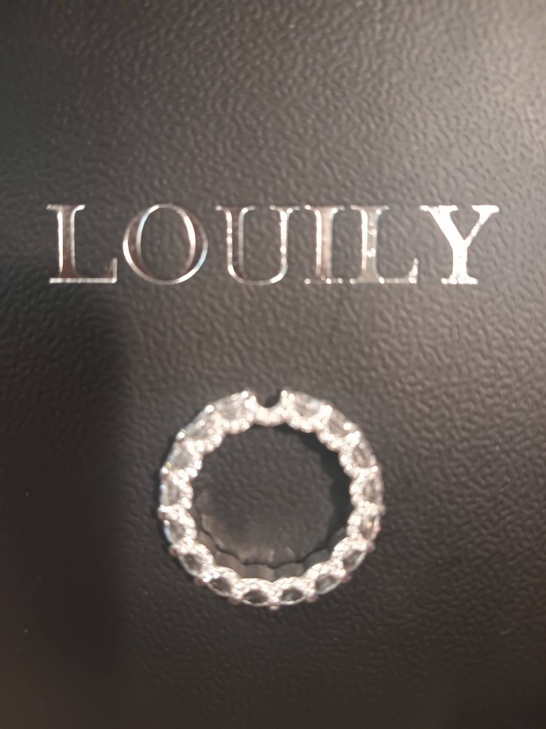 Customer photo review of Louily 5 Ct Luxury Eternity Round Cut Wedding Band In Sterling Silver