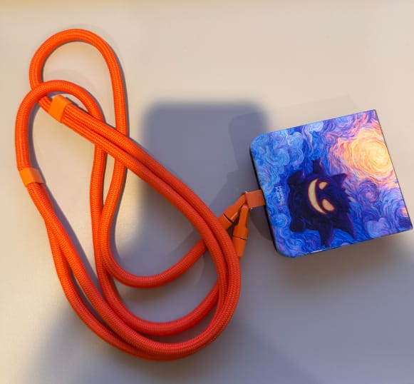 Customer photo review of Orange Phone Strap