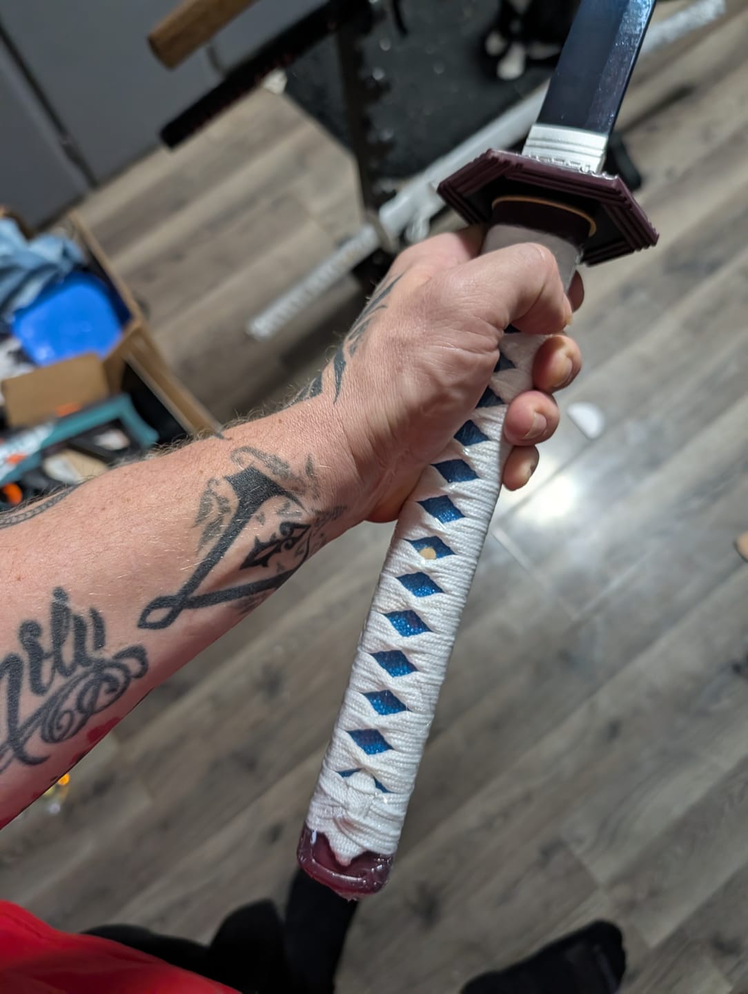 Customer photo review of The Giyuu Tomioka Handmade Katana Clay Tempered T10 Steel From Demon Slayer