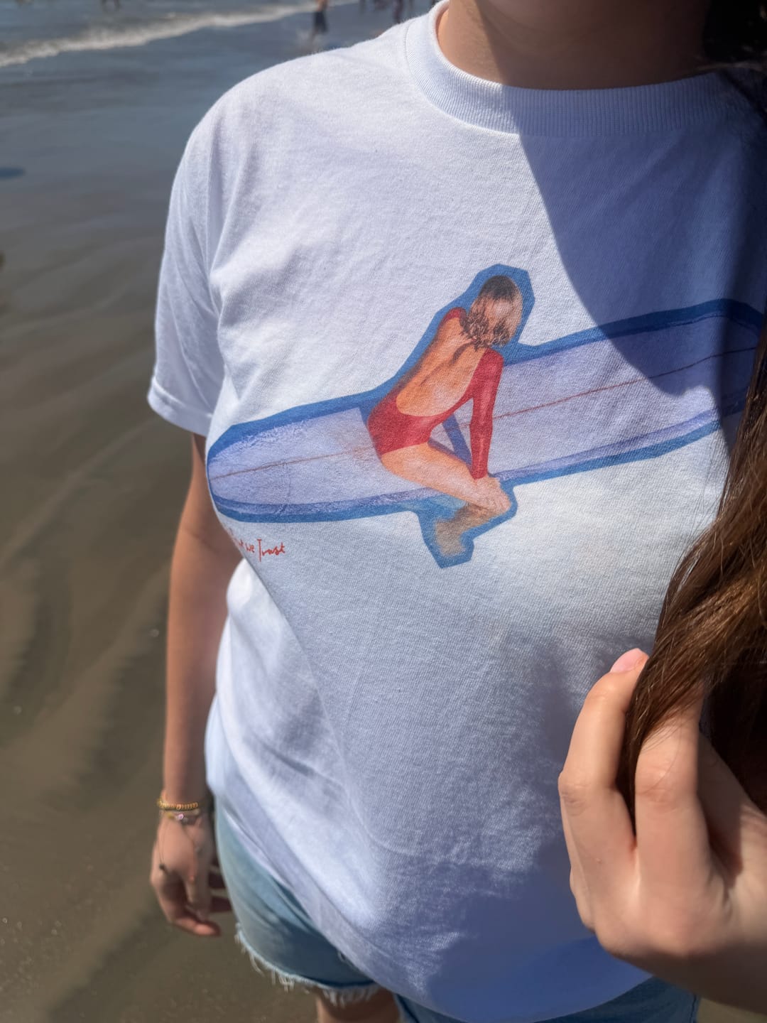 Customer photo review of surf's up baby tee