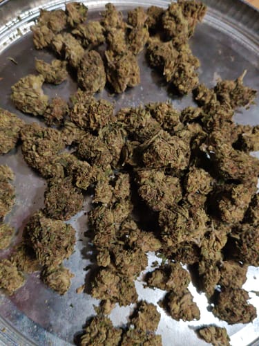 Customer's Wedding Cake buds spread out on a silver tray.