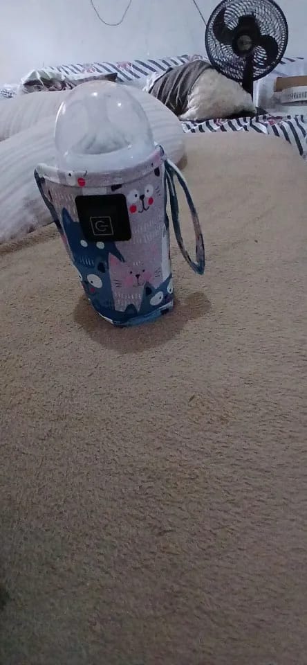 Customer photo review of Calentador de Biberones Portátil USB