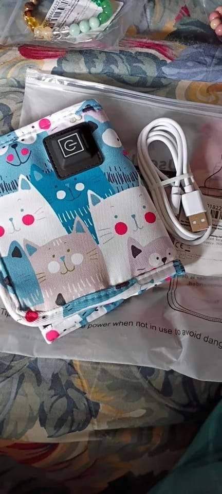Customer photo review of Calentador de Biberones Portátil USB