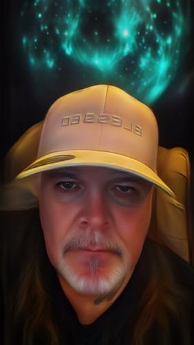 Close-up of a reviewer wearing the white Blessed Whiteout Version Hat.