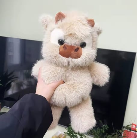 Customer photo review of MooMoo – La Vaquita Peluche que Corre