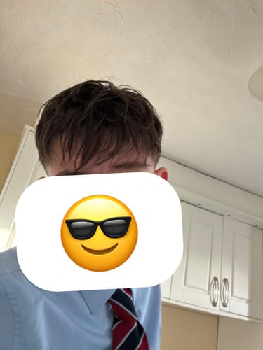 Reviewer showing their textured brown hair after using the Complete Styling Kit.