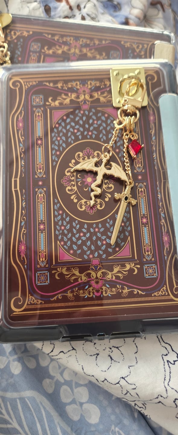 Customer photo review of Dragon Rider Charmlet - Gold