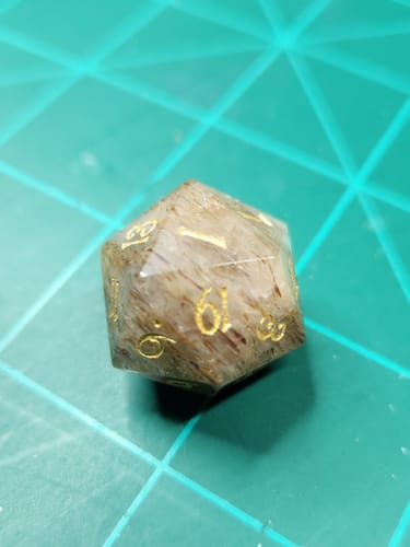Customer photo review of URWizards D&D Golden Rutilated Quartz Gemstone Engraved Dice Set(Limited edition)
