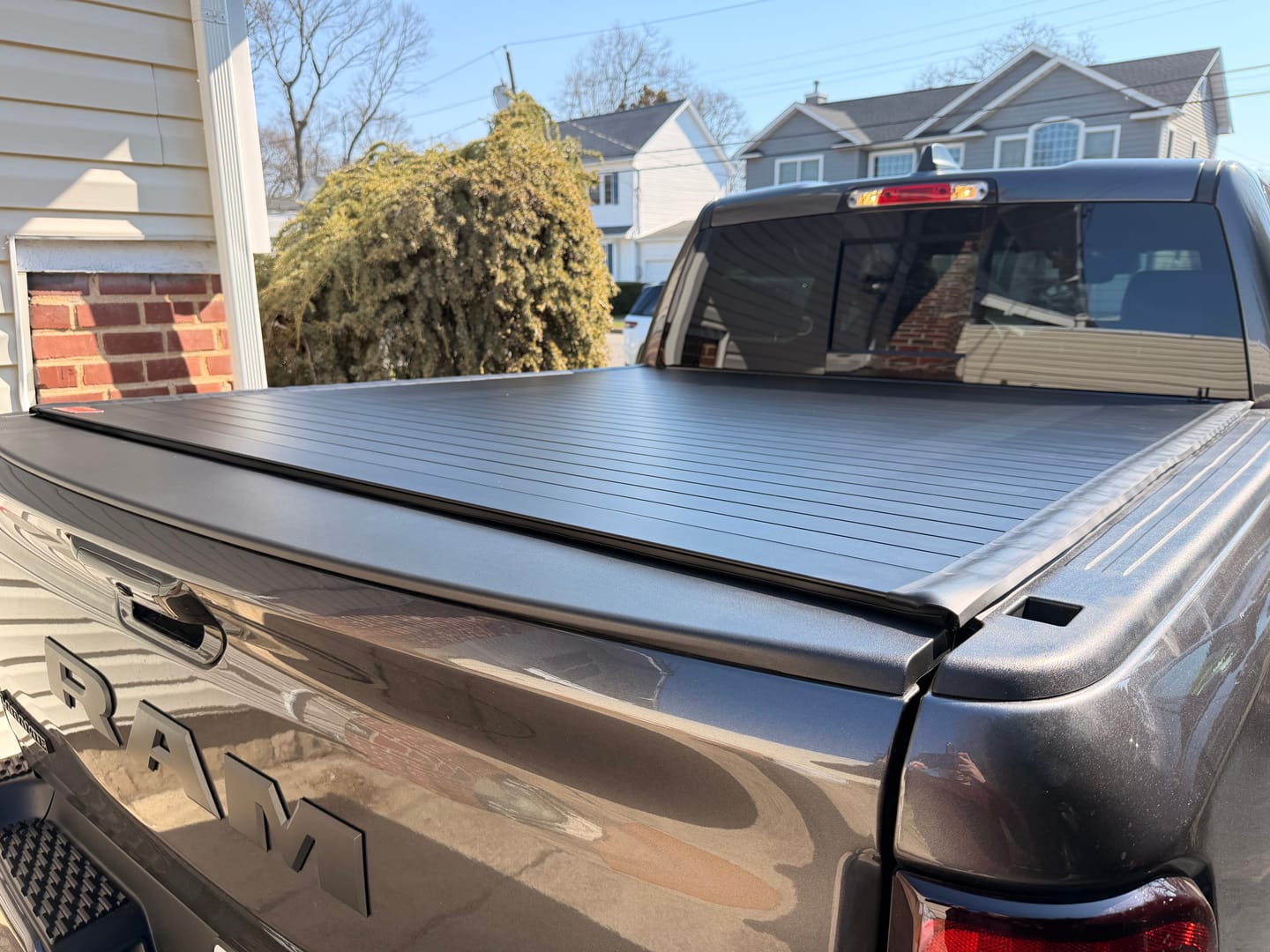 Customer photo review of Rough Country 50320550 Hard Roll Up Bed Cover | 5'7" Bed | Ram 1500 (19-26)/1500 TRX (21-24)