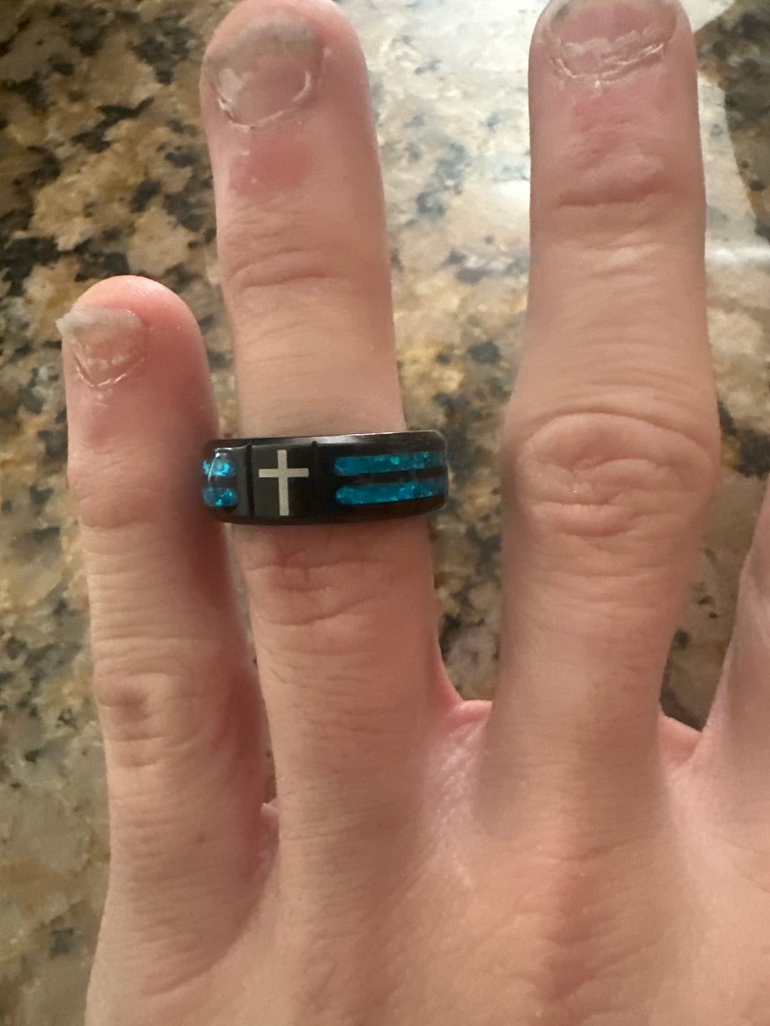 Customer photo review of Christianartworkshop Modern Titanium Steel Cross Ring with Laser Blue Inlay: Serenity in Christ's Blue Light