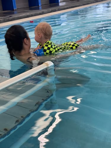 Customer photo review of UPF50+ Girls One Piece Swimsuit in Neon Electric Lime + Black Checkered