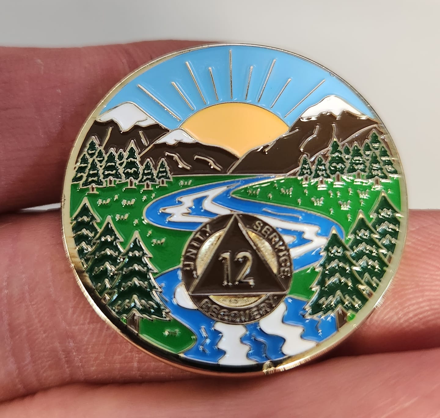 Customer photo review of 1 to 65 Year Sobriety Mint Winding River Gold Plated AA Recovery Medallion/Chip/Coin