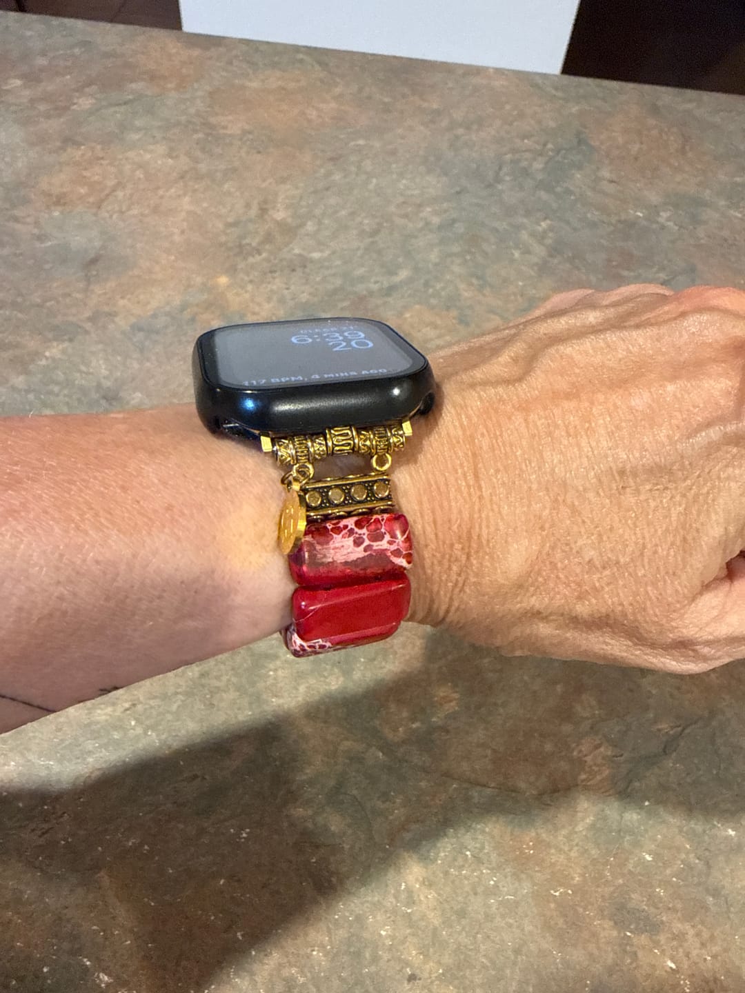 Customer photo review of Scarlet Tibetan Jasper Stretch Apple Watch Strap